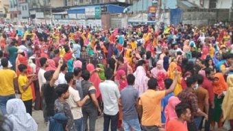 Police fire tear gas to disperse apparel workers protesting price rise in Dhaka